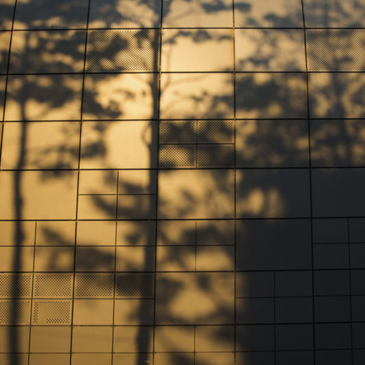 picture of the side of the building in a sunset