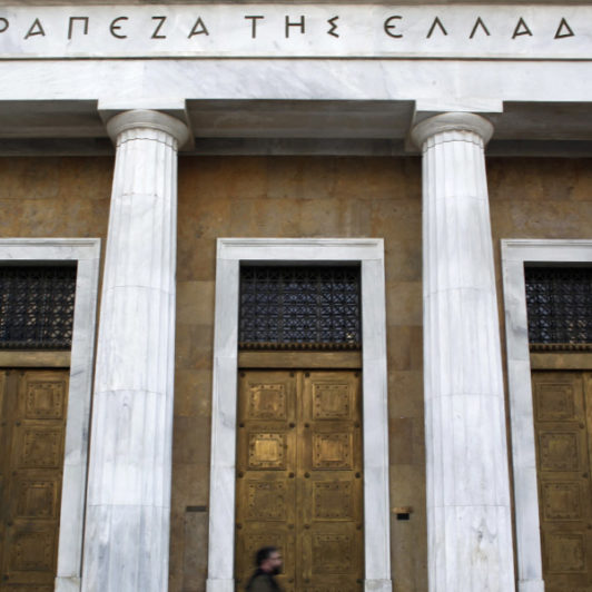 The closed entrance of a greek building